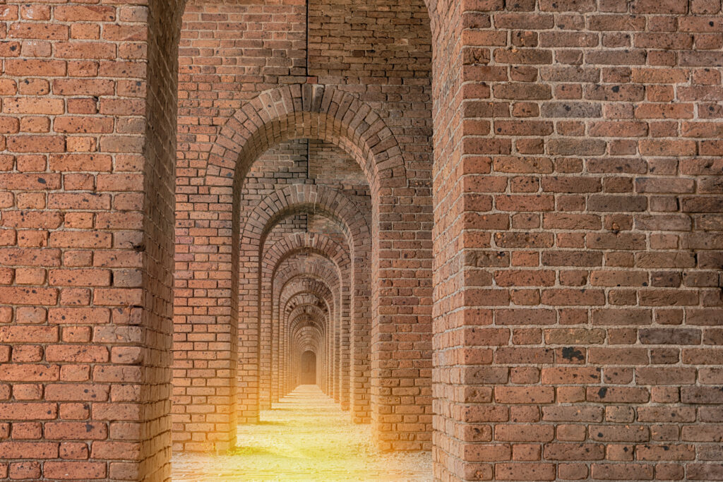 Door to Heaven. Light at end of the tunnel. Arches with old bricks within Fort Jefferson at Dry Tortugas National Park near Key West, Florida. Old achitecture.